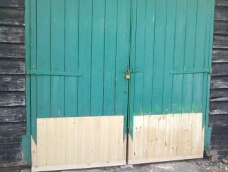 Remove rot and replace door bottom