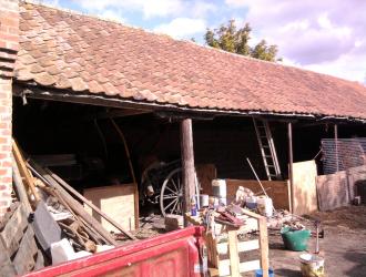 Put in new post to level and hold up roof